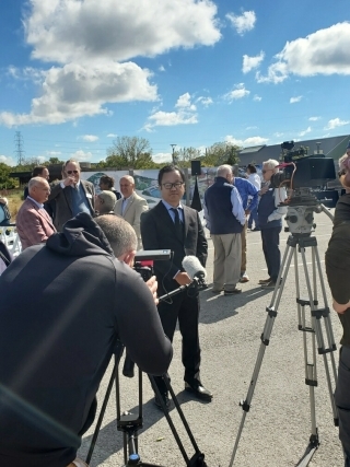 Deputy Consul-General with media.