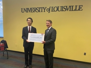 Consul-General presenting check